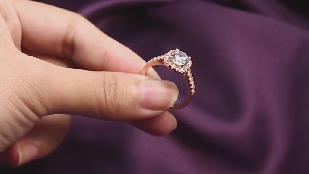 video of hand holding wedding ring